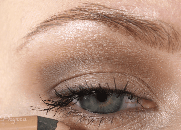 Apply mascara. Line the lower waterline with Midnight Cowboy pencil