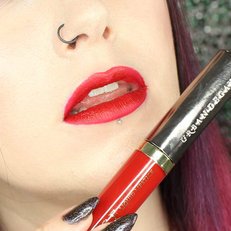 Urban Decay Vice Lipstick Crimson swatch on pale skin