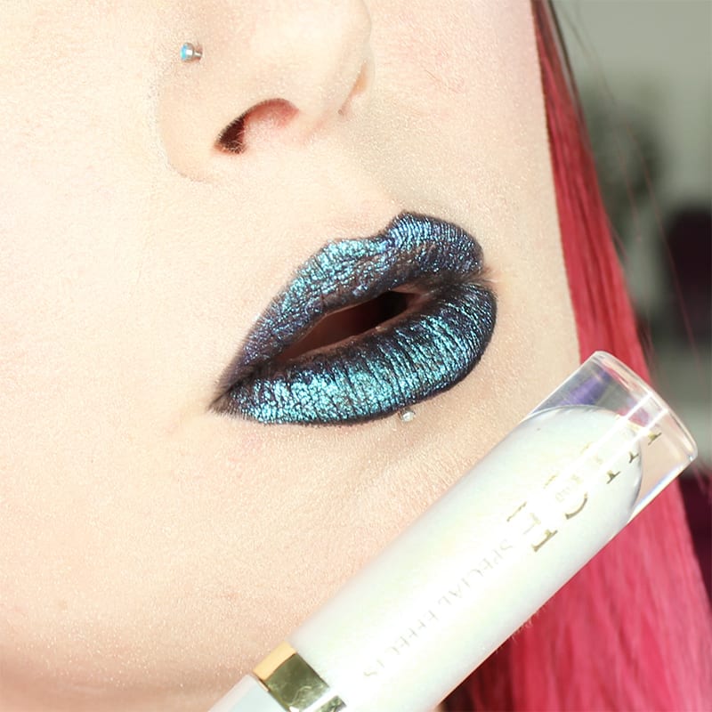 Urban Decay Vice Special Effects Lipstick Topcoat in White Lie on top of Perversion Vice lipstick