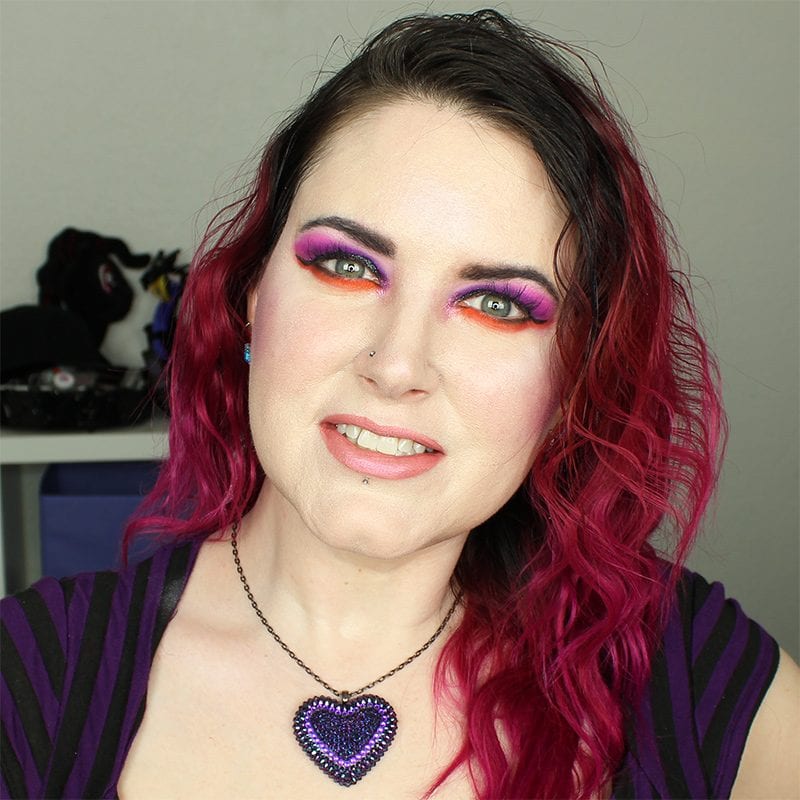 Wearing Kat Von D OG Lolita pencil, Muñeca liquid lipstick, and Alchemist Opal with orange and purple eyes