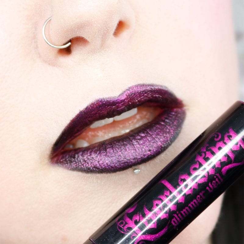 Wearing Urban Decay Voodoo lipstick and Kat Von D Razzle Glimmer Veil