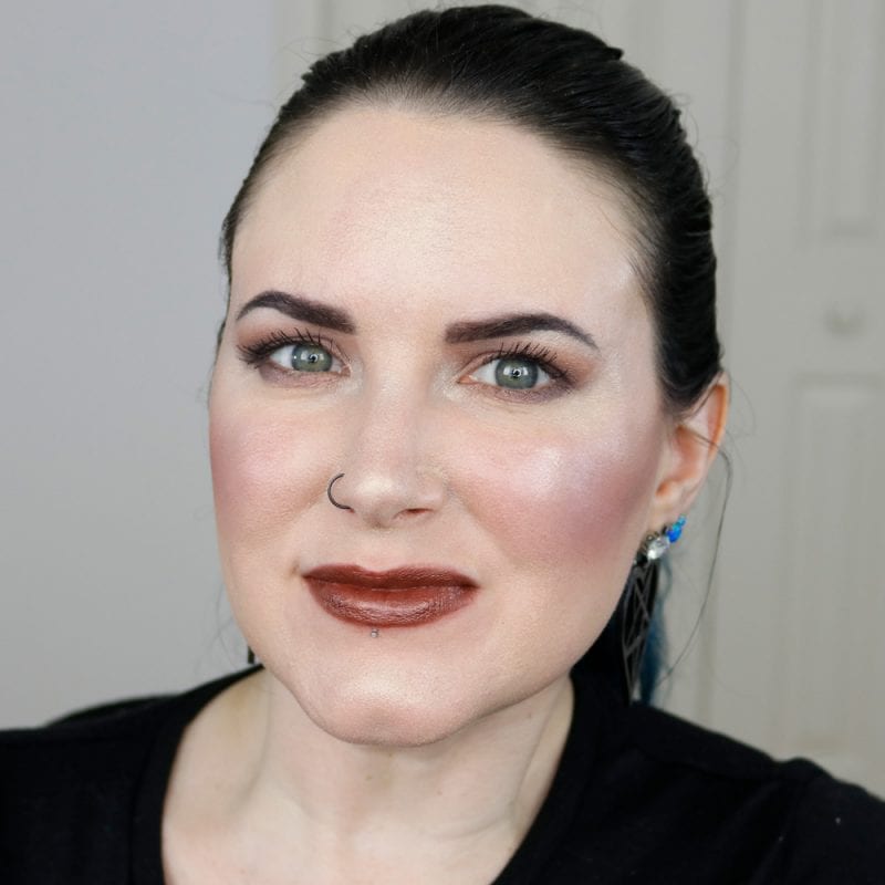 Urban Decay Naked Heat Vice Lipstick in Ember swatched on pale skin