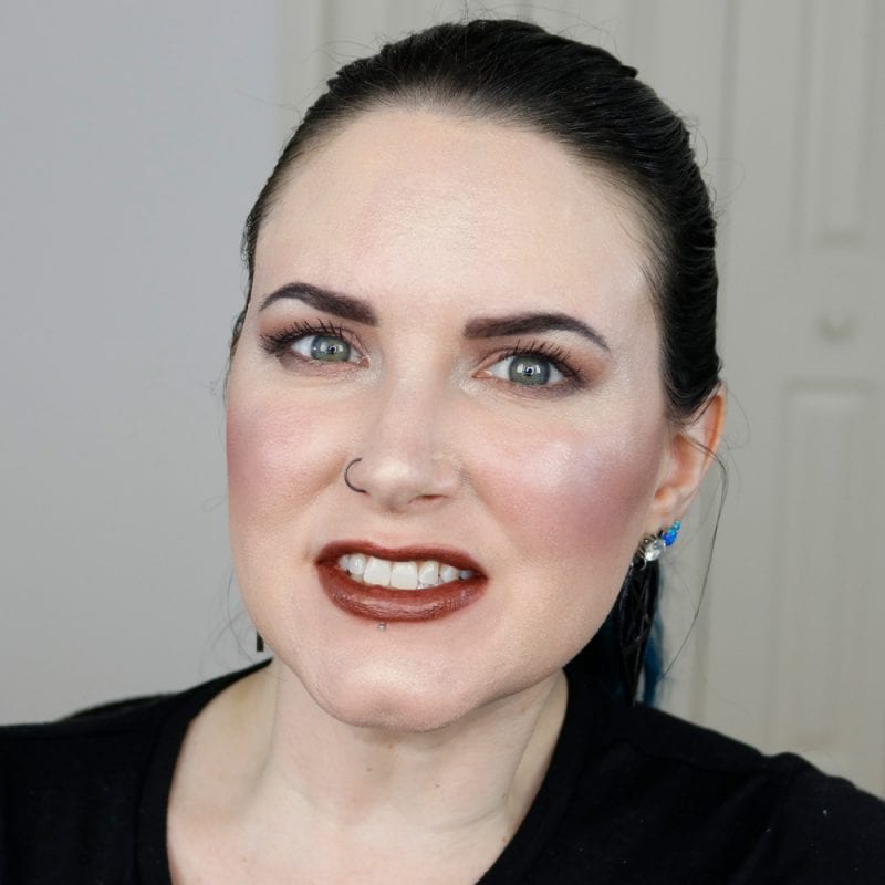 Urban Decay Naked Heat Vice Lipstick in Ember swatched on fair skin