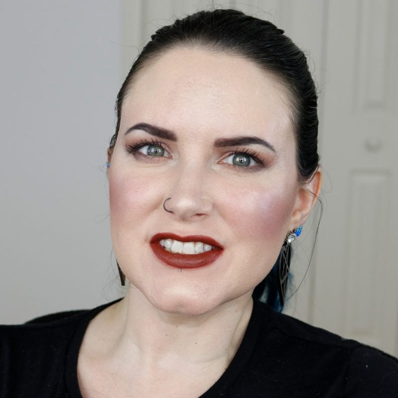 Urban Decay Naked Heat Vice Lipstick in En Fuego swatched on fair skin