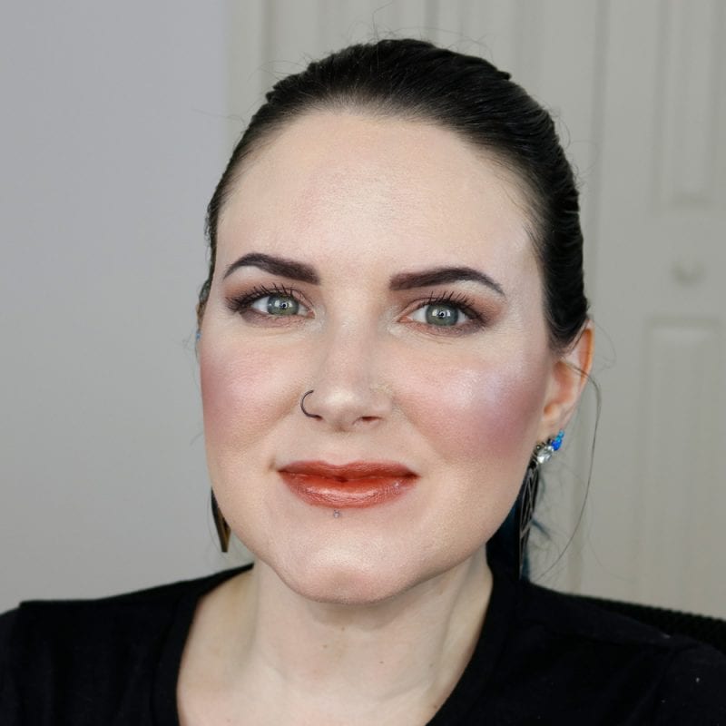 Urban Decay Naked Heat Vice Lipstick in Faith swatched on pale skin