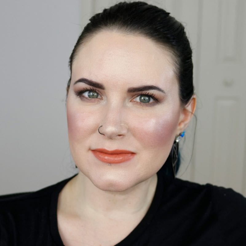 Urban Decay Naked Heat Vice Lipstick in Fuel swatched on pale skin