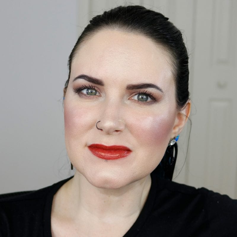 Urban Decay Naked Heat Vice Lipstick in Heat swatched on pale skin