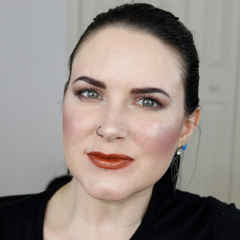 Urban Decay Naked Heat Vice Lipstick in Scorched swatched on pale skin