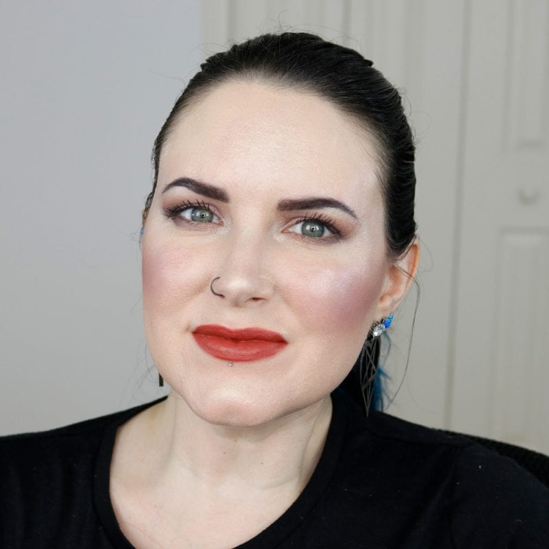 Urban Decay Naked Heat Vice Lipstick in Trip swatched on pale skin