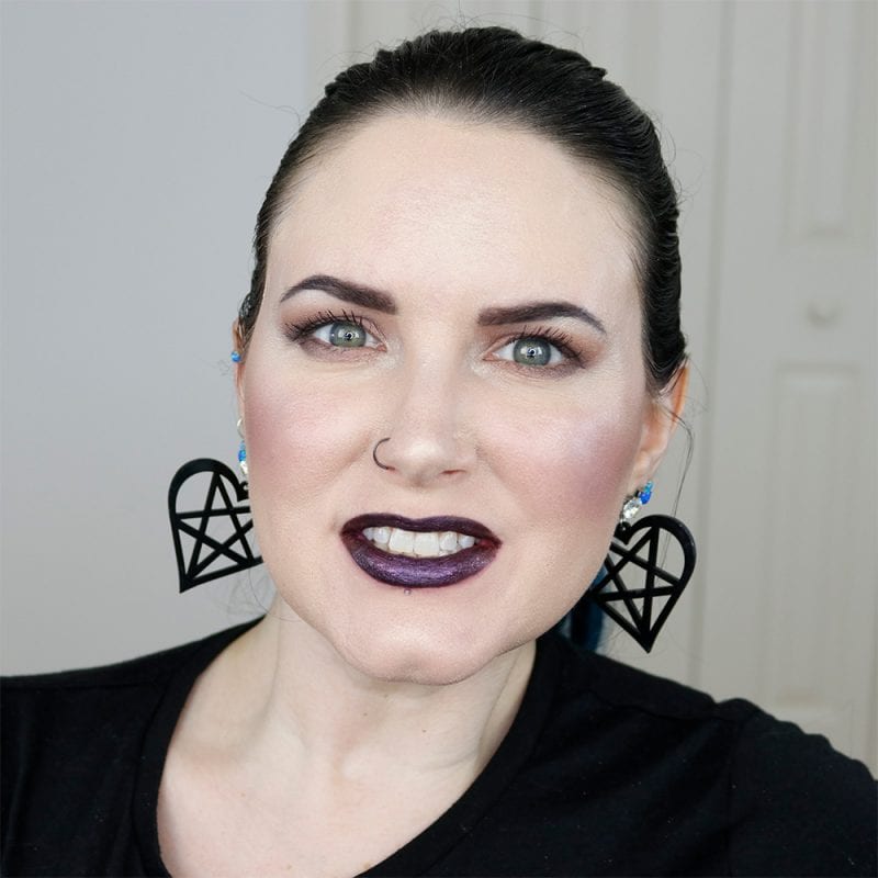 Urban Decay Vice Lipstick in Voodoo swatched on pale skin