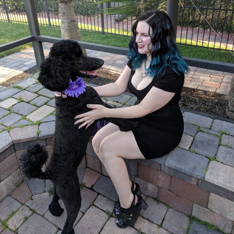 Wearing my sexy goth dress and holding my goth puppy