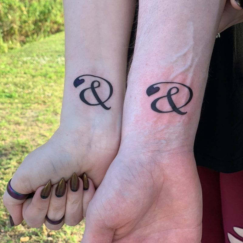 Dave and Courtney's matching ampersand tattoos by Stefanee at Forbidden Images in Trinity Florida #gothicstyle #polyamory #tattoos