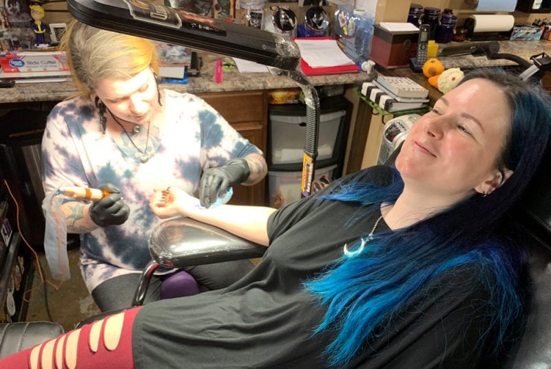 Courtney with her tattoo artist Stefanee