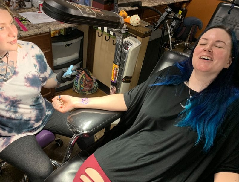 Courtney with her tattoo artist Stefanee
