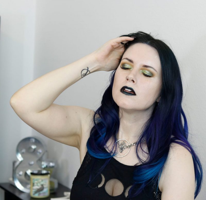 Courtney is wearing Black Moon Orb of Light Palette plus ET and Hydrogen on the eyes, Murmaider on the lips, and Shroom and Squid on the cheeks