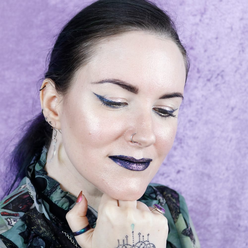 Courtney is wearing Black Moons Sorrow and Moonrise on the lips