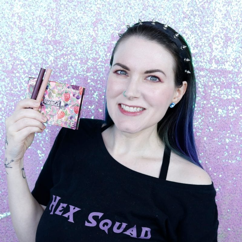 Courtney is wearing the Hex Squad Shirt