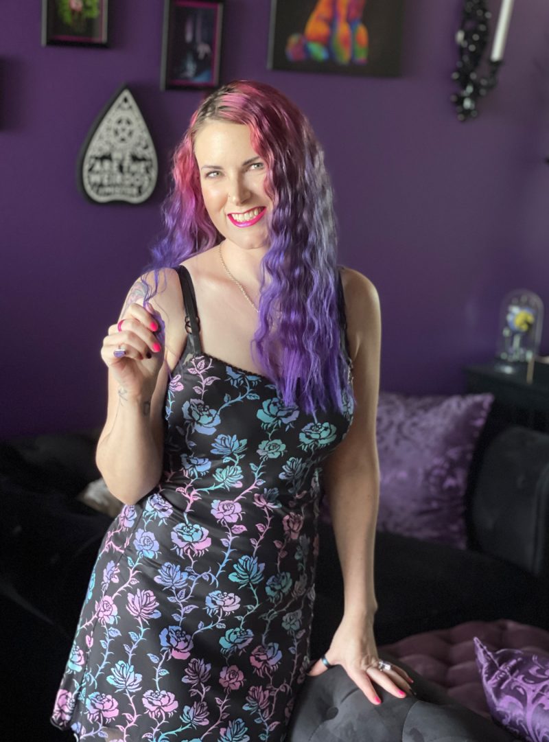 Black dress with pastel rose print