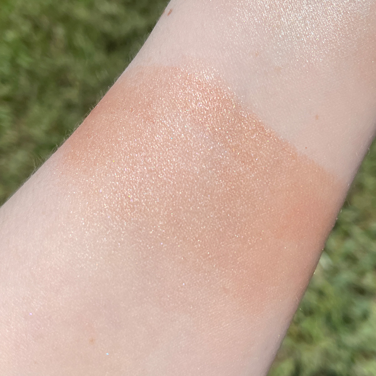Lime Crime Sunkissed Glimmering Skin Stick in Maui swatched on pale skin