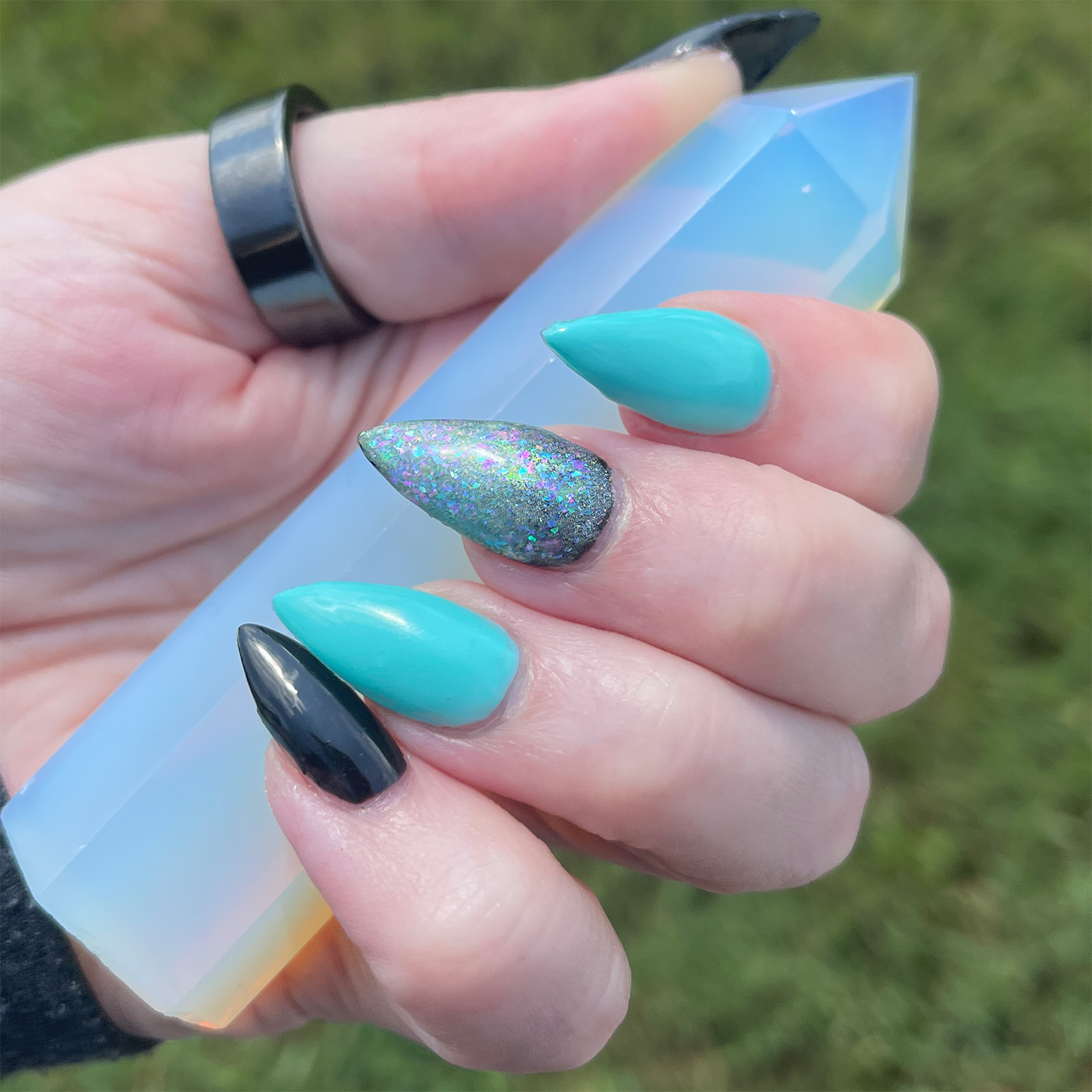 teal stiletto nails