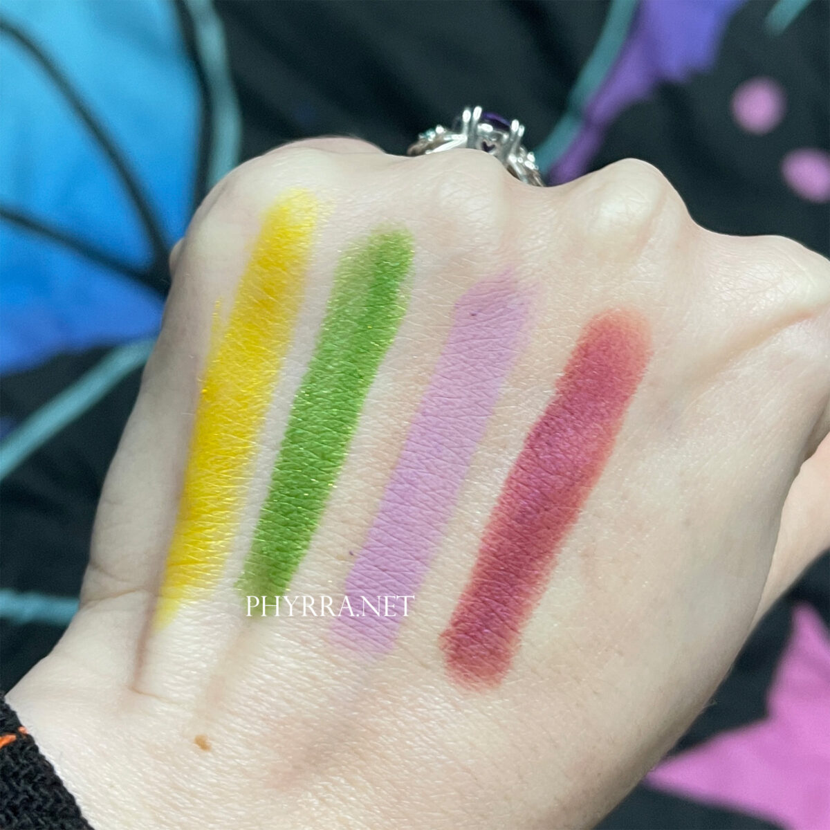 Lime Crime Electric Slide swatches on fair skin