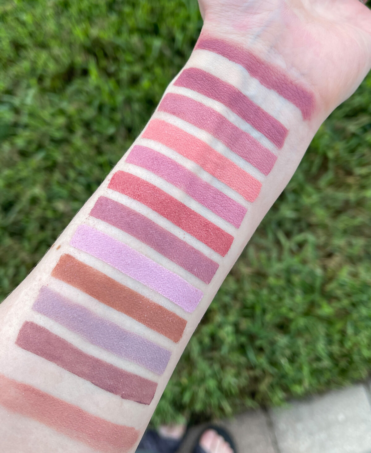 Cool toned dusty pink, salmon, lilac and taupe eyeshadow swatches on fair skin