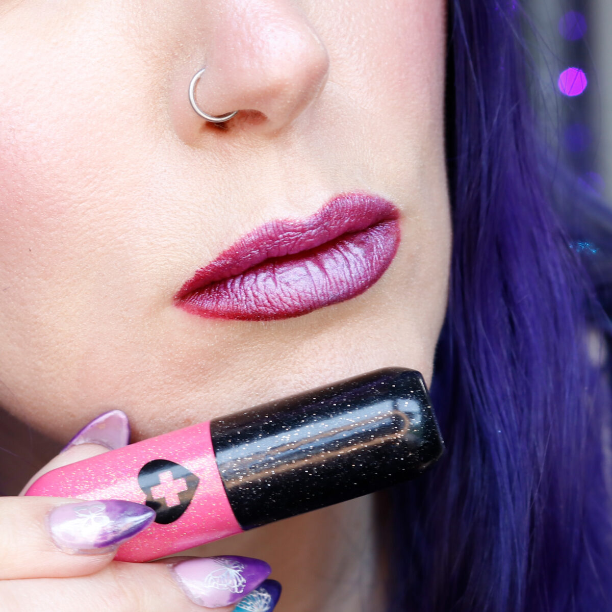 Deep red wine lip with blue-violet shift