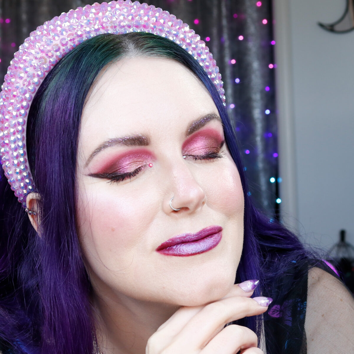 a red duochrome makeup look on hooded eyes