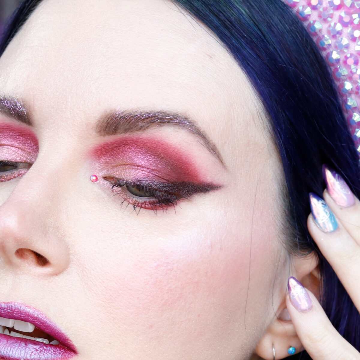 a red Multichrome indie makeup eyeshadow look on Hooded Eyes
