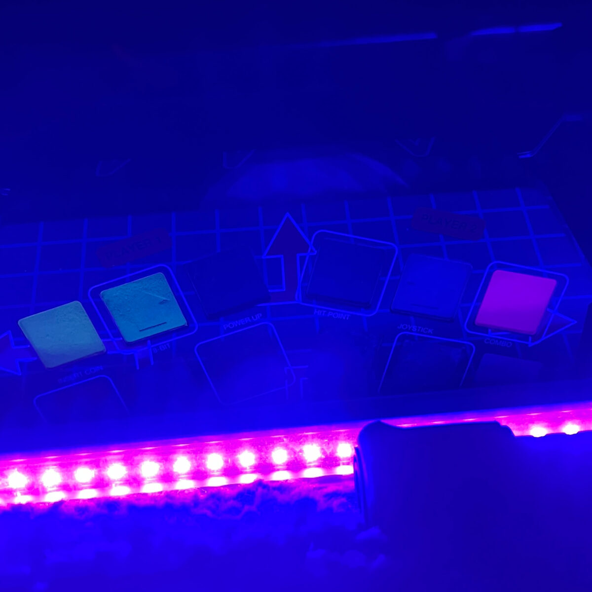 a UV Reactive indie makeup palette under blacklight