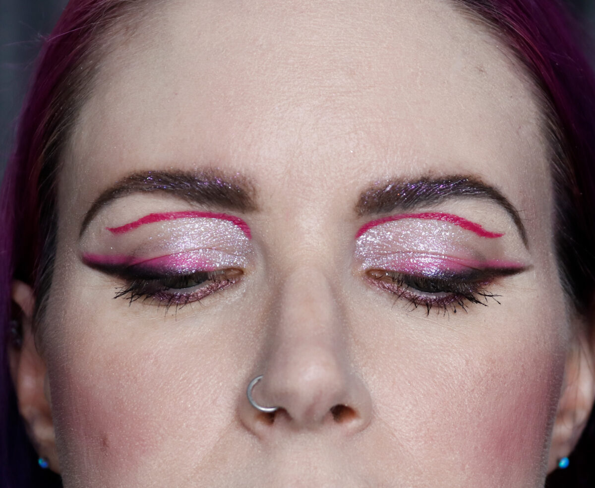 Cordelia created a hot pink and iridescent pink graphic liner look