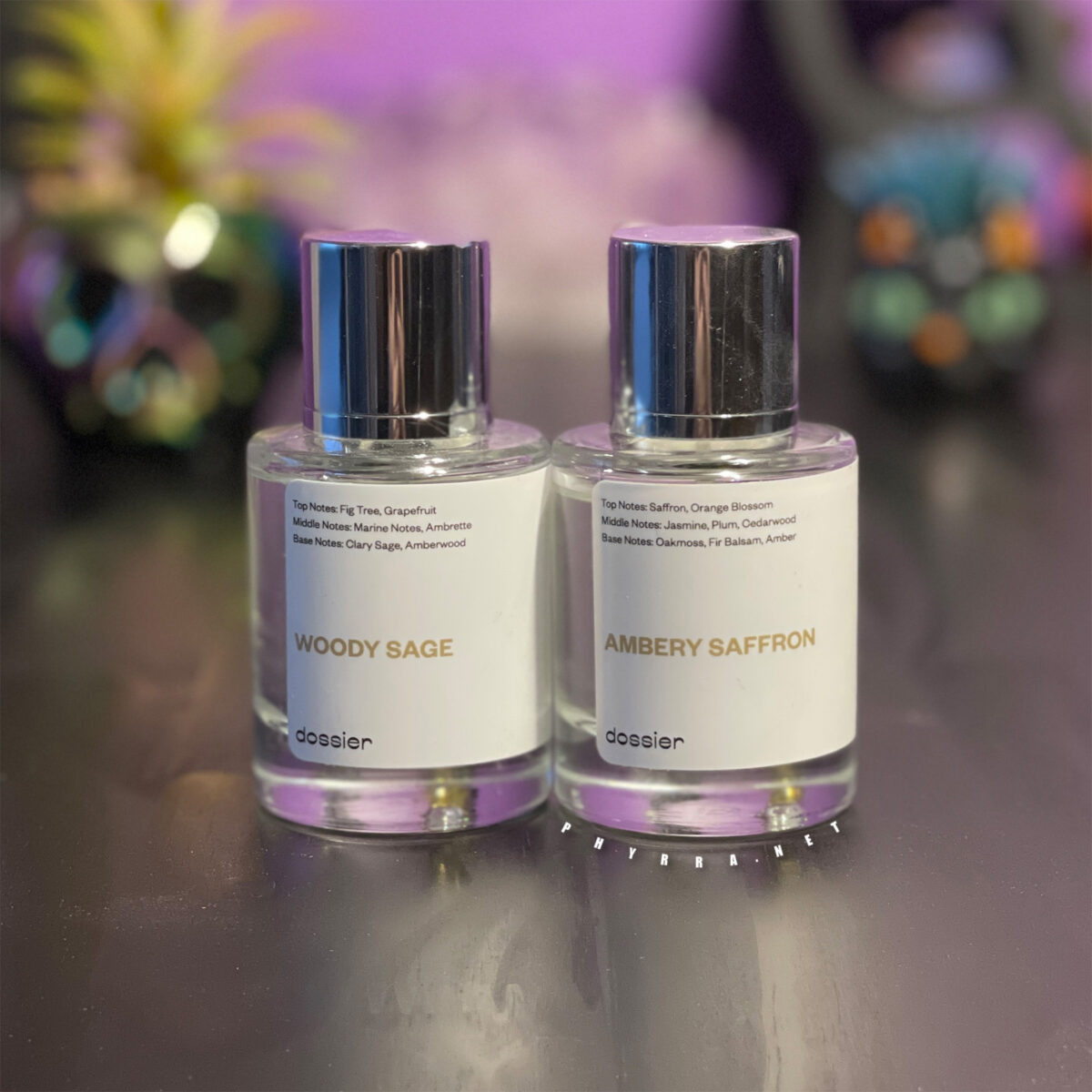 two bottles of Dossier Perfume in recyclable glass bottles