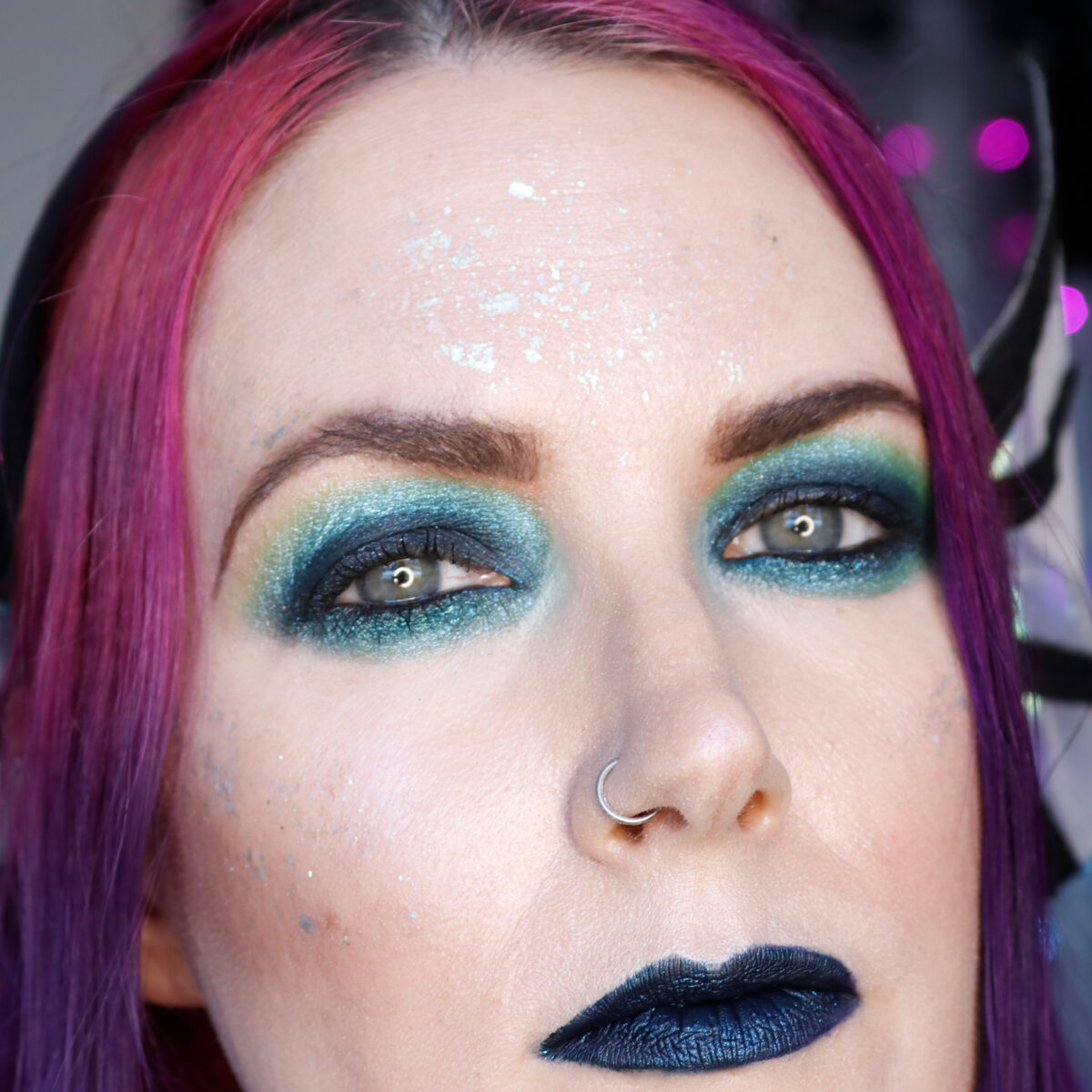 Cordelia used Danessa Myricks Infinite Chrome Flakies in Pixie Dust to mimic iridescent mermaid skin on her face