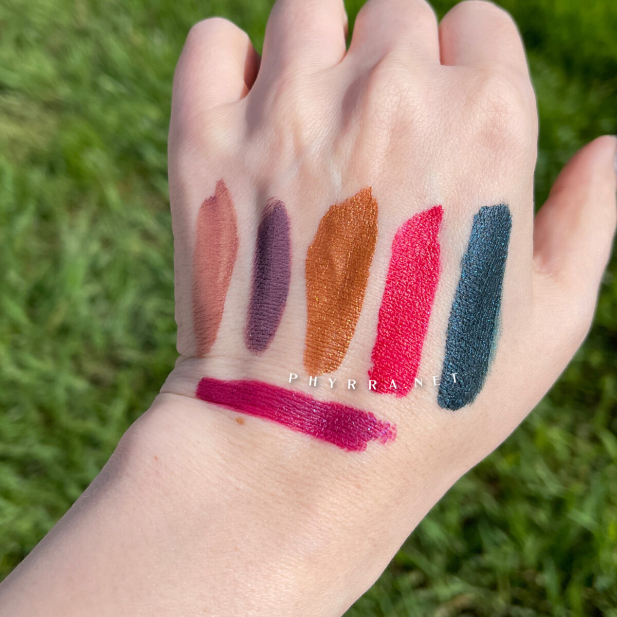 Sugarpill Liquid Lip Colors swatched on very fair skin