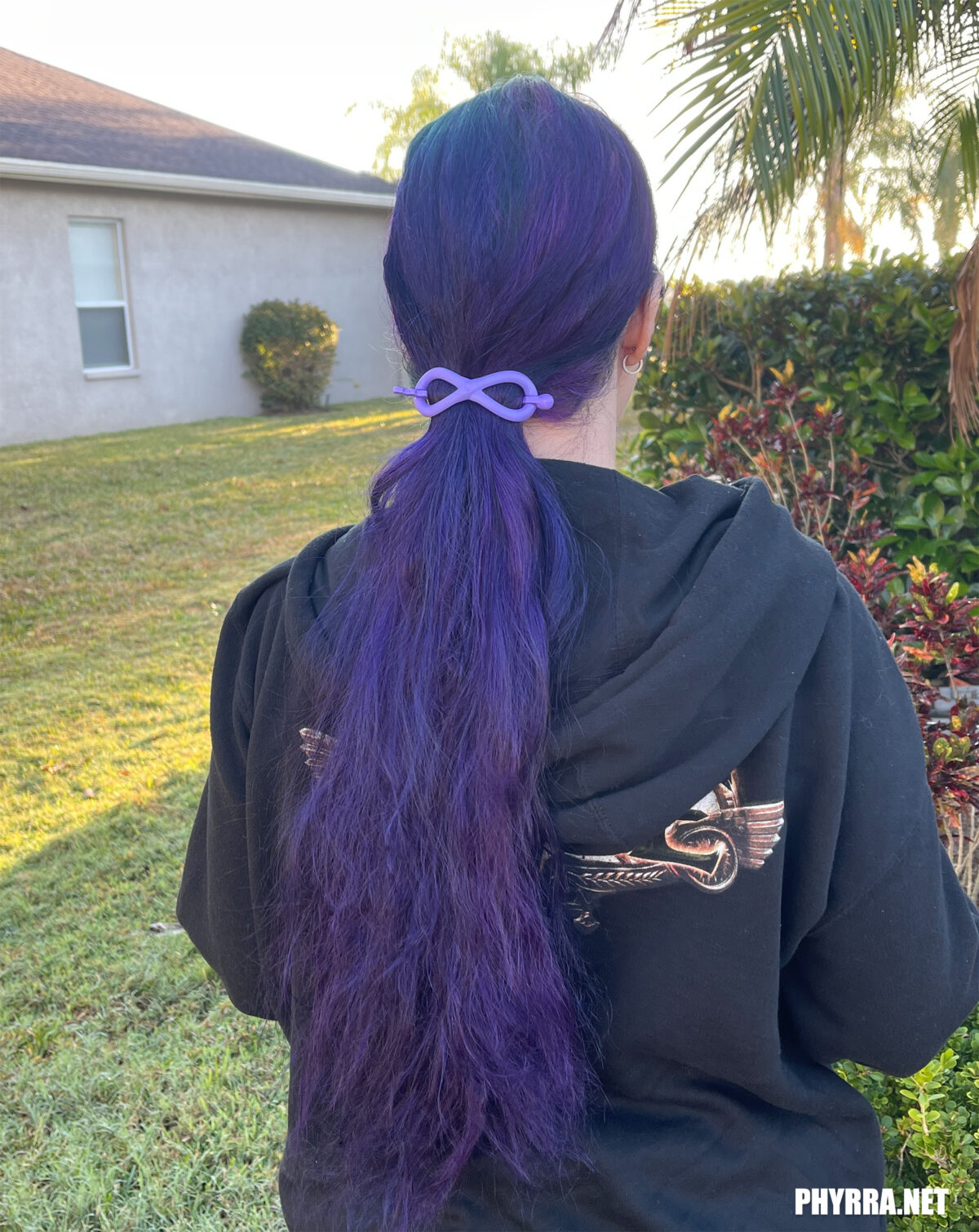 My long hair bound by a single purple clip