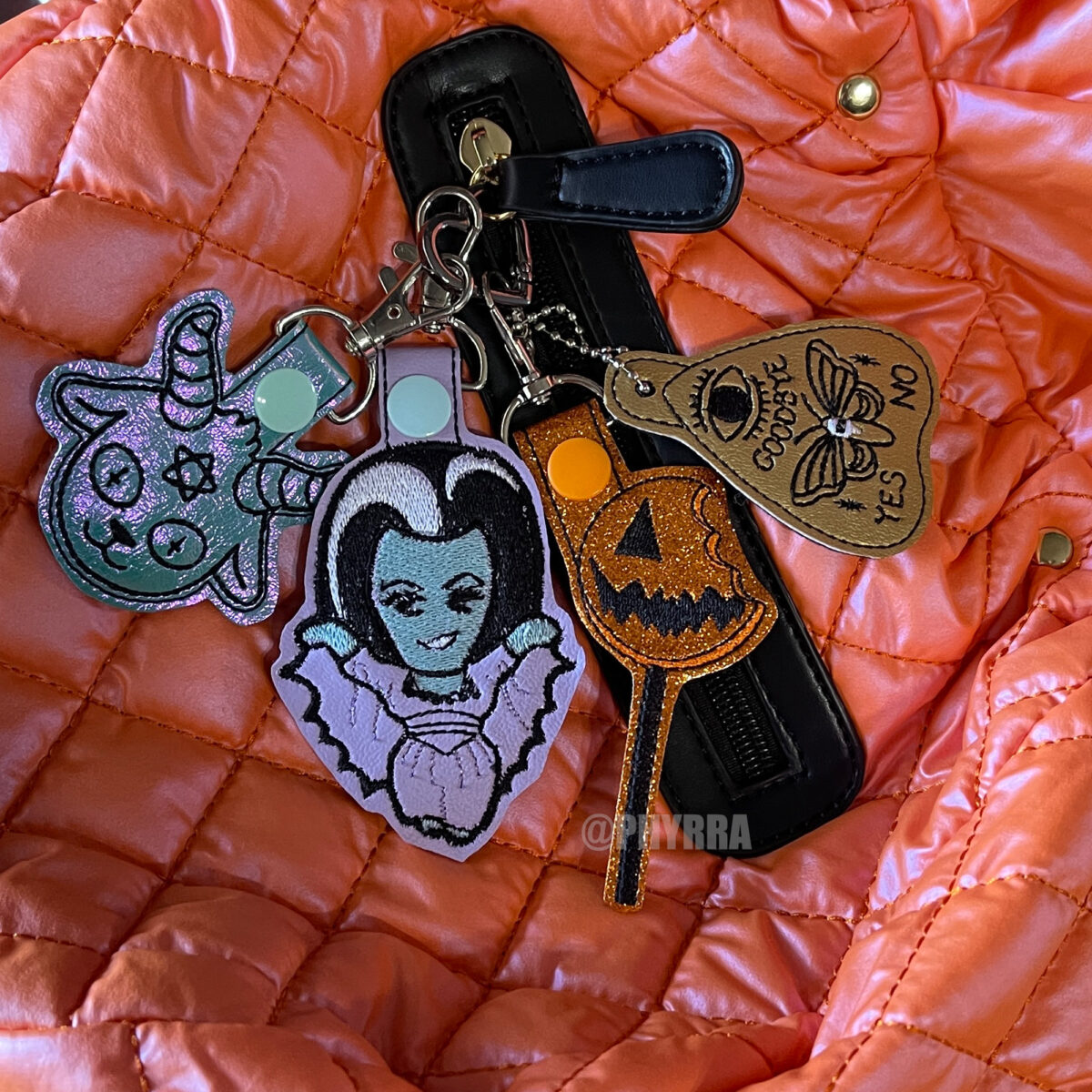 Every Day is Halloween, so Halloween Keychains on the outside of the bag