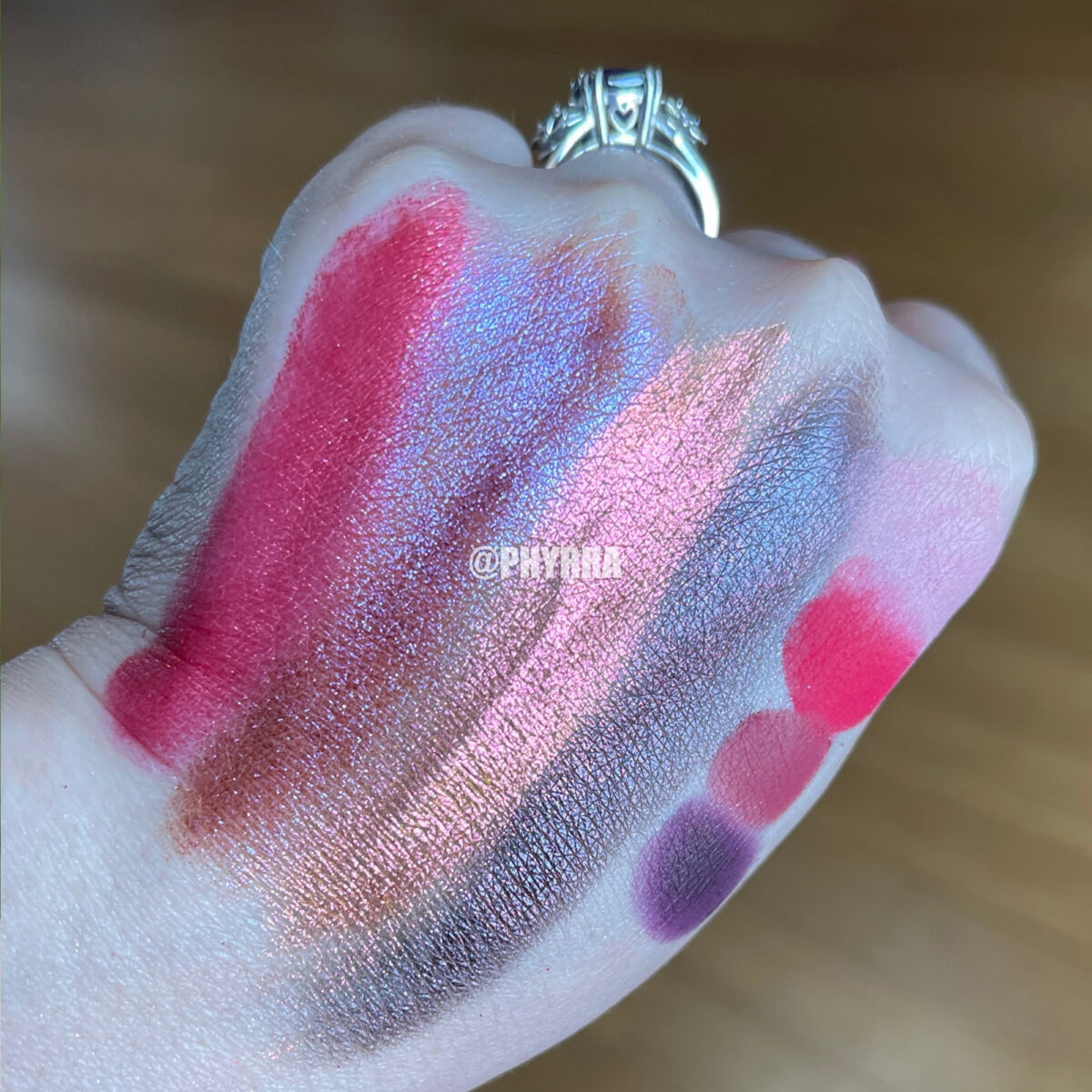 red eyeshadow palette swatches on fair skin