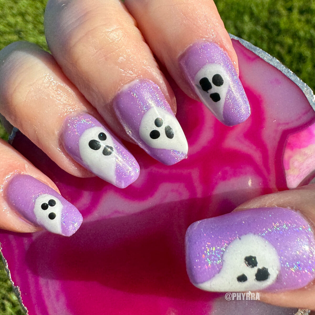 Cordelia created this DIY custom purple glow in the dark gel nail polish