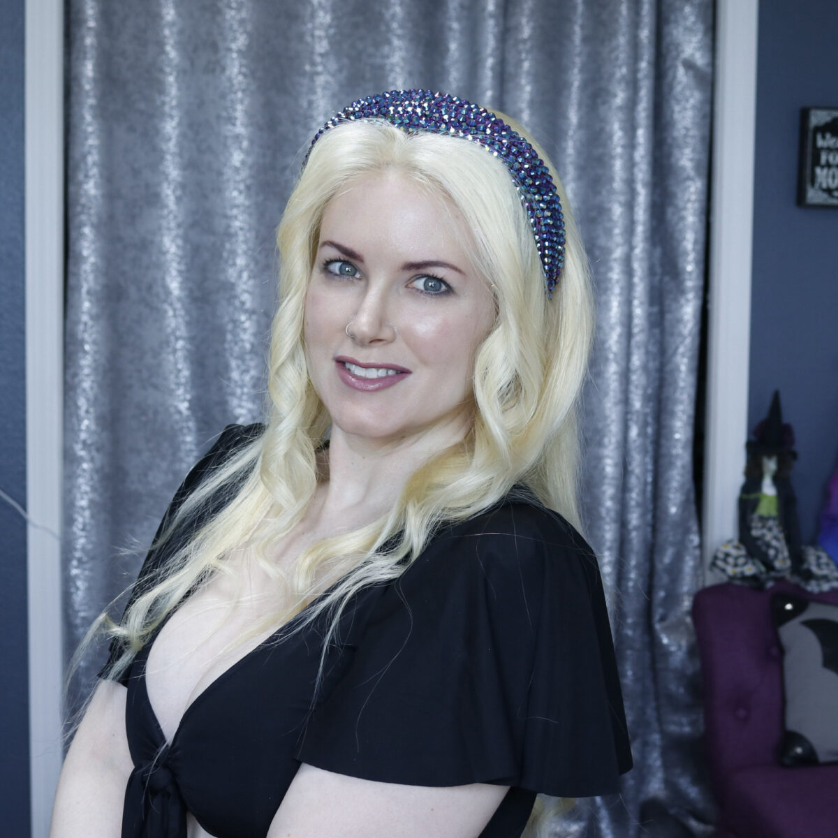 Cordelia is wearing the Irresistible Me Front Lace Human Wig 24" platinum blonde