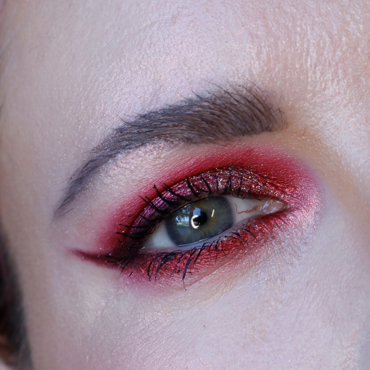 Red eyeshadow with blue eyes