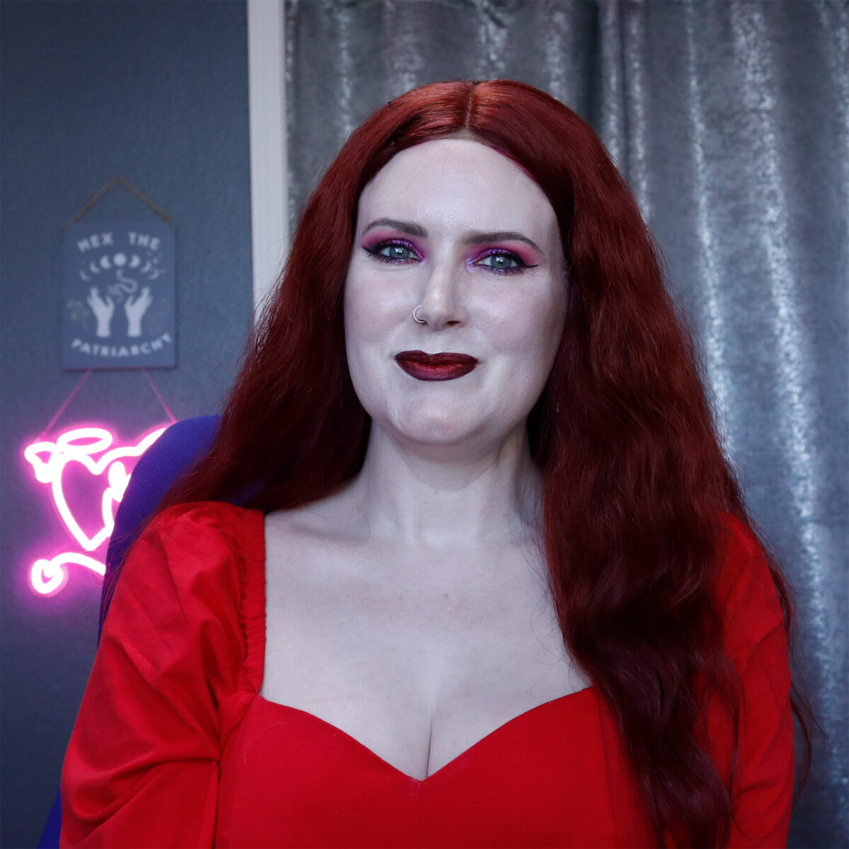 Red wig, red eye makeup, red lip makeup