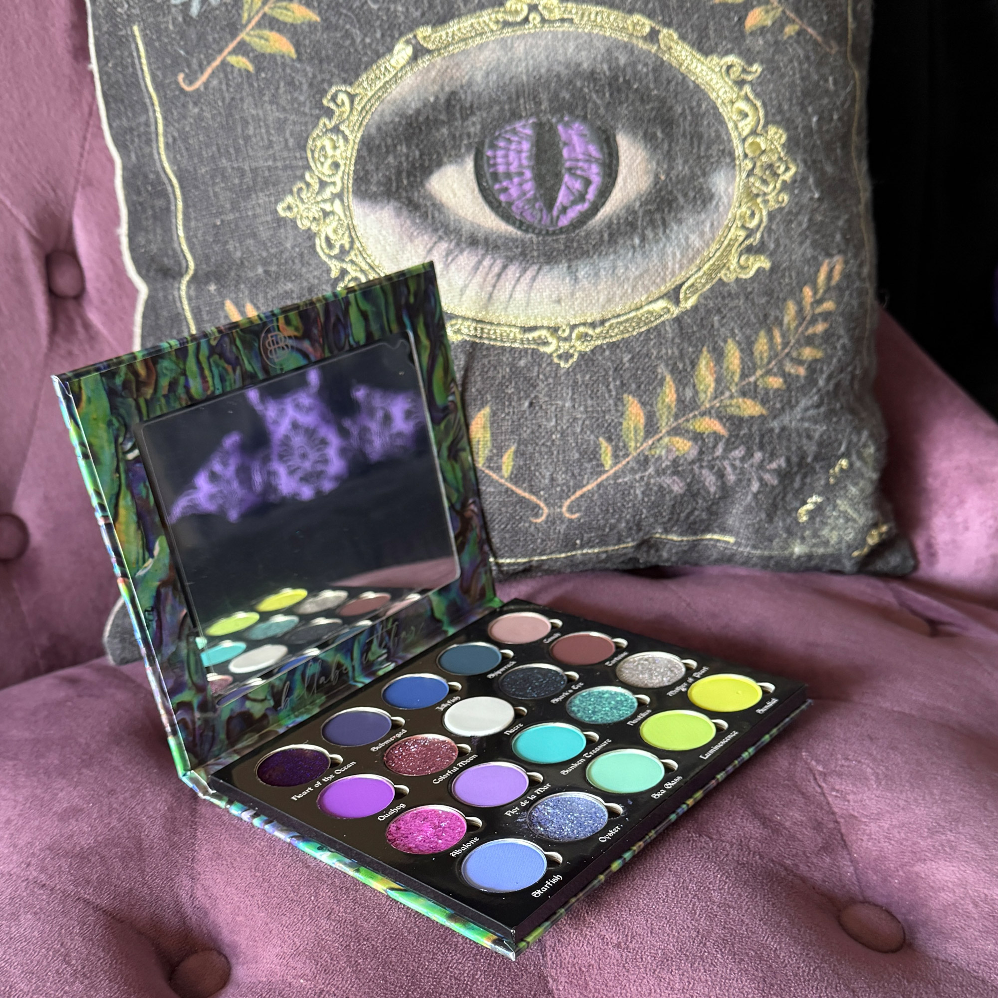 Luxury Indie eyeshadow palette with multichrome, duochrome, and buttery mattes by Bellabeautebar. Photo by Cordelia Frost, indie makeup expert