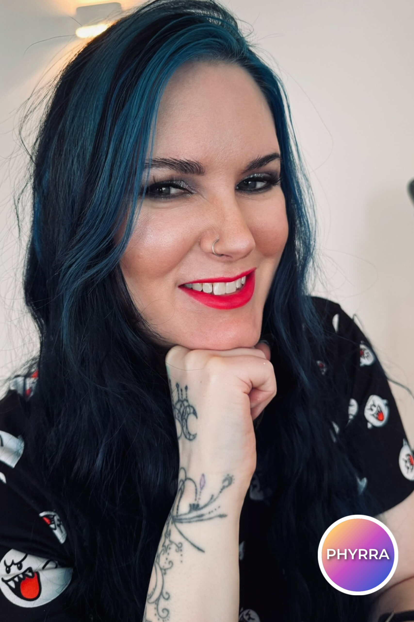 Cordelia is wearing Laura Geller Baked Balance-n-Brighten Foundation in Fair here. You can see how it is deeper than her skin tone by looking at her hand and arm.